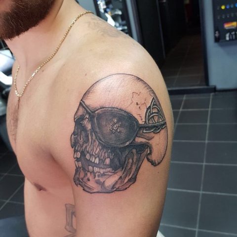 skull tattoo, one eyed Willie tattoo, goonies tattoo